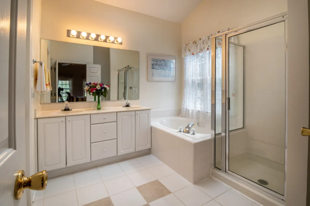 Awards in New Plymouth showcasing classic bathroom renovations with double vanity and glass shower by Bathroom Renovations New Plymouth