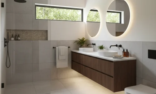 Ensuite upgrades in New Plymouth featuring double vanity, round mirrors, and glass shower by Bathroom Renovations New Plymouth